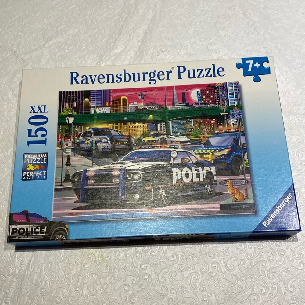 BNWOT Ravensburger Puzzle Size 19”X 14” . Age 7 + .